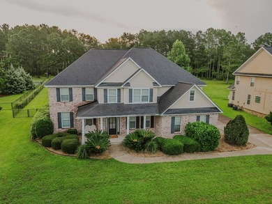 Welcome home to this stunning, light-filled brick residence - photo 1