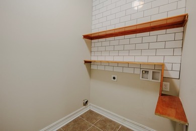 Welcome home to this stunning, light-filled brick residence - photo 10