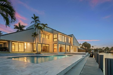 Experience luxury waterfront living in this extensively - photo 1