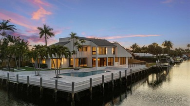 Experience luxury waterfront living in this extensively - photo 2