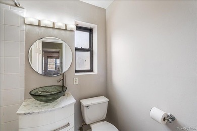 Welcome to this charming top-floor, one-bedroom walk-up located - photo 15