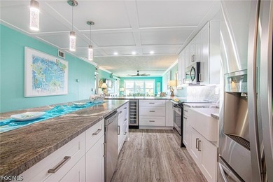Fully renovated and move-in ready, this stunning first-floor - photo 7