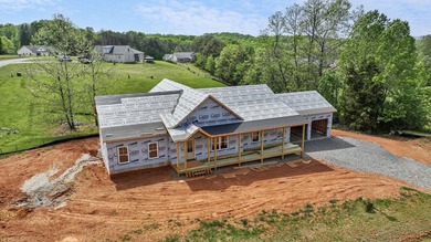 Quality new construction on a beautiful 1.7-acre corner lot! - photo 2