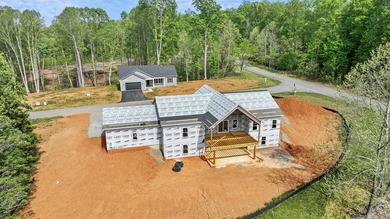 Quality new construction on a beautiful 1.7-acre corner lot! - photo 3