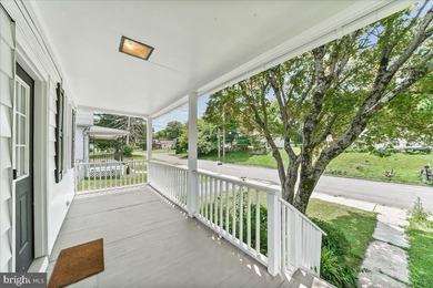 This charming bungalow offers a perfect blend of comfort and - photo 3
