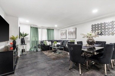 Welcome to this well-maintained three-family home in the Bronx - photo 3