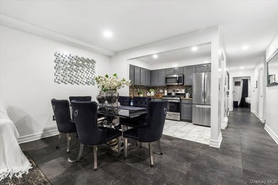 Welcome to this well-maintained three-family home in the Bronx - photo 4