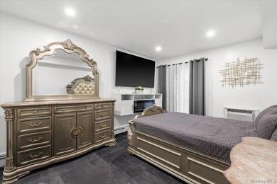 Welcome to this well-maintained three-family home in the Bronx - photo 7