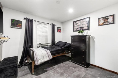 Welcome to this well-maintained three-family home in the Bronx - photo 8