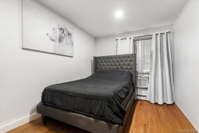 Welcome to this well-maintained three-family home in the Bronx - photo 9