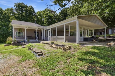 Step into this cozy home and property, The property offers a - photo 1