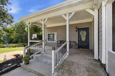 Step into this cozy home and property, The property offers a - photo 2