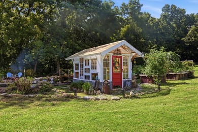 Step into this cozy home and property, The property offers a - photo 3