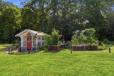 Step into this cozy home and property, The property offers a - photo 4