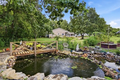 Step into this cozy home and property, The property offers a - photo 6