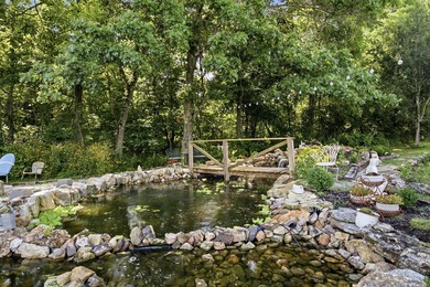 Step into this cozy home and property, The property offers a - photo 8