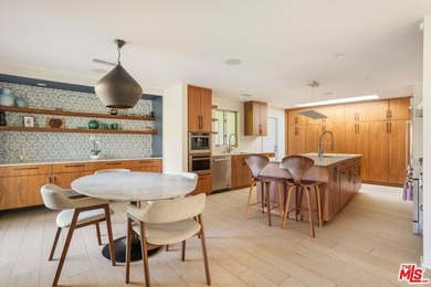 Located in the coveted Santa Monica Canyon, this reimagined - photo 11