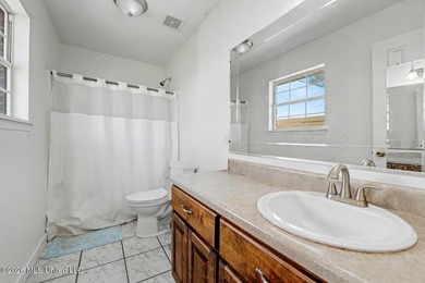This spacious 4-bedroom, 2 bath home with a bonus room situated - photo 11