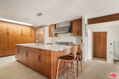 Located in the coveted Santa Monica Canyon, this reimagined - photo 12