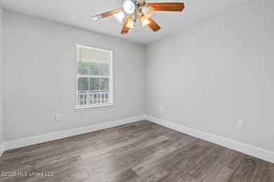 This spacious 4-bedroom, 2 bath home with a bonus room situated - photo 12