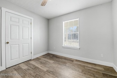 This spacious 4-bedroom, 2 bath home with a bonus room situated - photo 13
