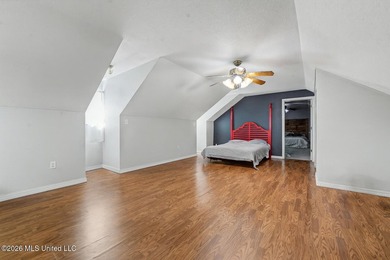This spacious 4-bedroom, 2 bath home with a bonus room situated - photo 15