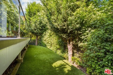Located in the coveted Santa Monica Canyon, this reimagined - photo 27