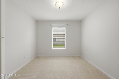 Set on a uniquely private lot with a pond to one side, wooded - photo 32