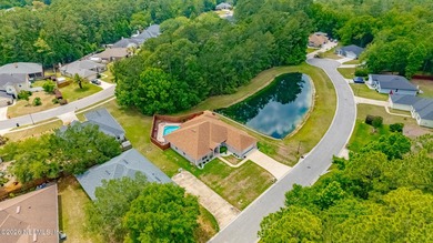 Set on a uniquely private lot with a pond to one side, wooded - photo 41