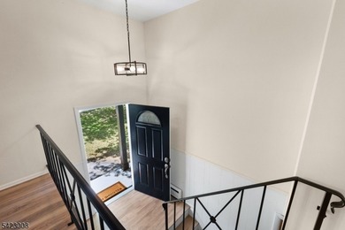 Welcome to this newly renovated bilevel, positioned perfectly on - photo 7