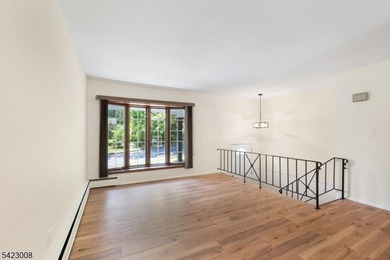 Welcome to this newly renovated bilevel, positioned perfectly on - photo 9
