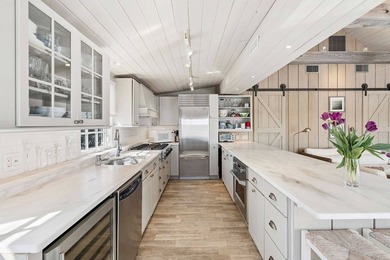 This rare, charming beachfront escape feels like you are on the - photo 9