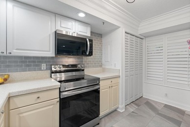 ABSOLUTELY GORGEOUS WATERFRONT CONDO | FIRST FLOOR UNIT | HIGHLY - photo 10