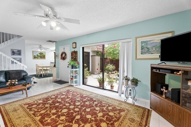 Nestled in a beautiful garden setting overlooking the lake & - photo 2