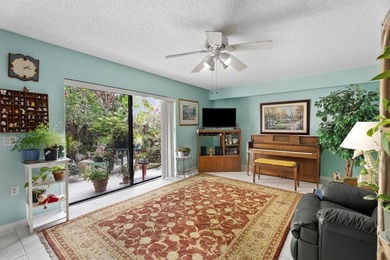 Nestled in a beautiful garden setting overlooking the lake & - photo 4
