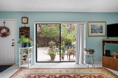 Nestled in a beautiful garden setting overlooking the lake & - photo 5