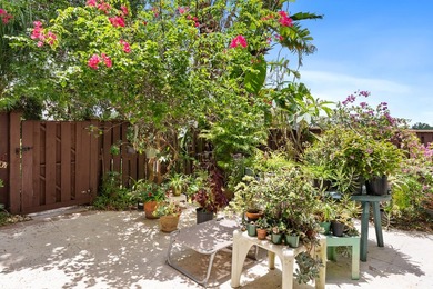 Nestled in a beautiful garden setting overlooking the lake & - photo 6
