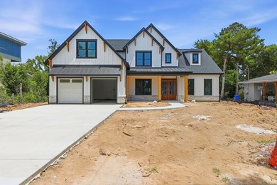 Introducing 406 63rd Ave N. - a true custom coastal residence - photo 1