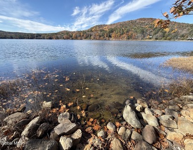 This beautiful lakefront building lot offers 253' of private - photo 6