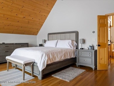 Nestled within Teton Pines, this exceptional Cluster Home offers - photo 11