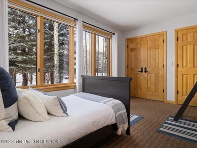 Nestled within Teton Pines, this exceptional Cluster Home offers - photo 15