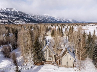 Nestled within Teton Pines, this exceptional Cluster Home offers - photo 16