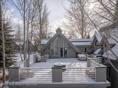 Nestled within Teton Pines, this exceptional Cluster Home offers - photo 18