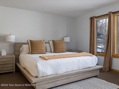 Nestled within Teton Pines, this exceptional Cluster Home offers - photo 22
