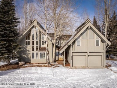 Nestled within Teton Pines, this exceptional Cluster Home offers - photo 23