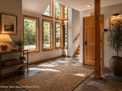 Nestled within Teton Pines, this exceptional Cluster Home offers - photo 25