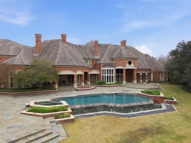 Welcome to 5305 Hillcrest Drive, a sprawling 5.7-acre property