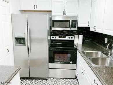 This Gulf Access Condo is located in a beautiful setting - photo 3
