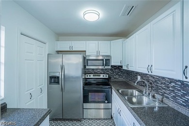 This Gulf Access Condo is located in a beautiful setting - photo 4