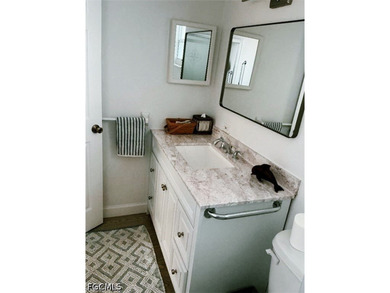 This Gulf Access Condo is located in a beautiful setting - photo 9
